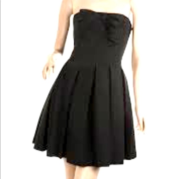 A/X Armani Exchange black taffeta strapless dress.
Size 4
C - Picture 1 of 5